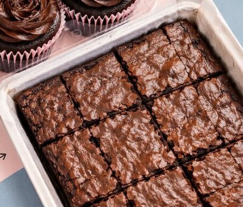 Freshly baked classic brownies in the tray